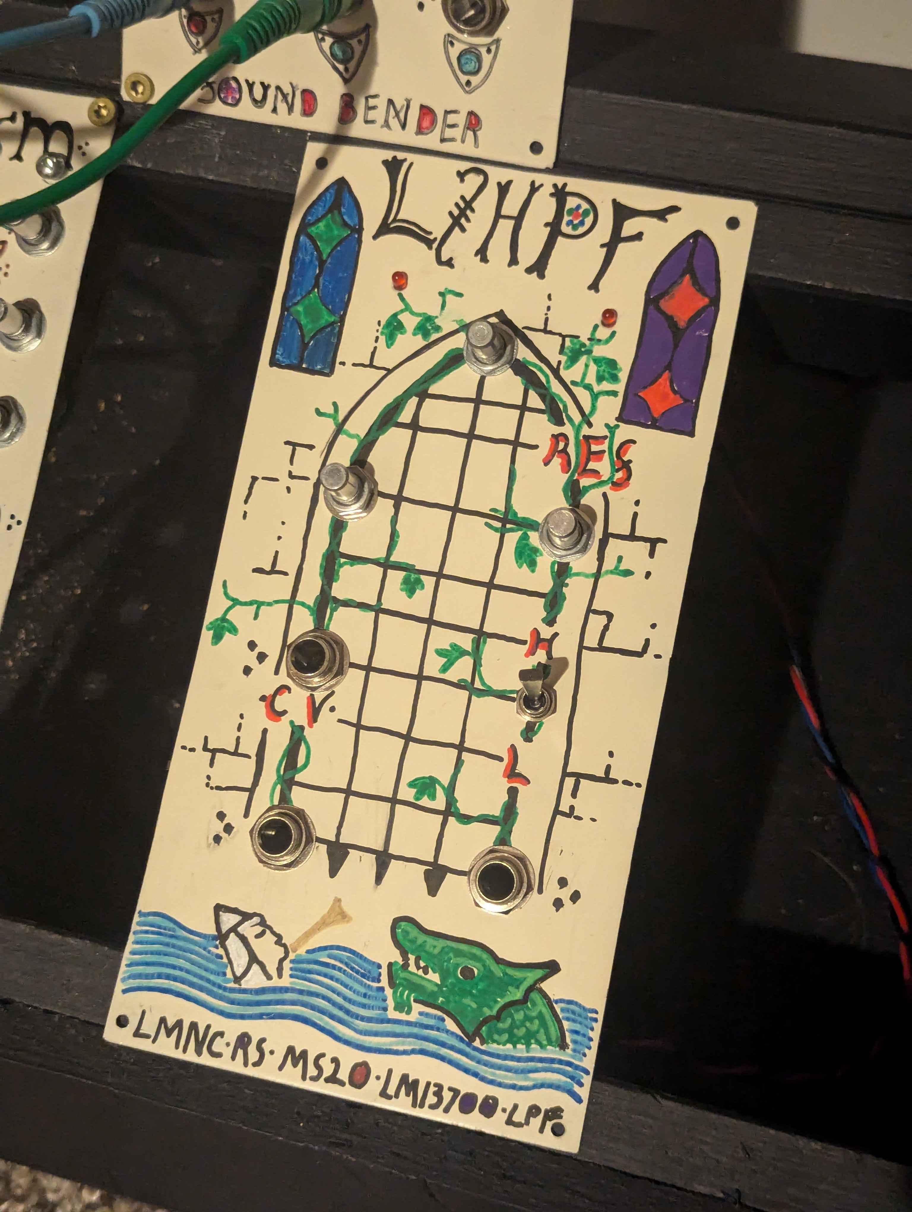 The front of the Filter module depicting a portcillus a dragon and a knight.
